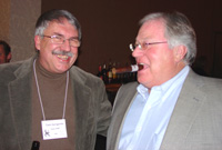Tom-Gengerke-left-celebrates-his-final-day-on-the-job-with-Iowa-DNR-with-Jim-Riis-at-the-joint-Iowa-and-Dakota-Chapter-meeting